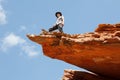 Man standing on the rock edge