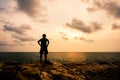 man standing on the rocks at the sea Royalty Free Stock Photo