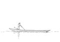 Man standing on rowing long boat