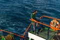 Man standing on the ship. Passengers on ferry boat headed to sabang island. KMP BRR