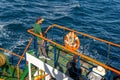 Man standing on the ship. Passengers on ferry boat headed to sabang island. KMP BRR