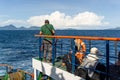 Man standing on the ship. Passengers on ferry boat headed to sabang island. KMP BRR