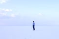 Man standing deadpan shore frozen sea downshifting way relaxes winter seascape