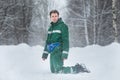 A man standing at snowy road outdoors in winter Royalty Free Stock Photo