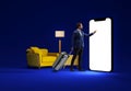 Man standing with suitcase at home near yellow sofa and pointing at giant smartphone screen against blue background Royalty Free Stock Photo