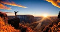 a man standing on top of a cliff at sunset Royalty Free Stock Photo