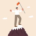 Man is standing on the top of a mountain and holds a winner flag. Goal achievement concept. Winner, success. Business reaching Royalty Free Stock Photo