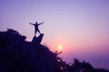 Man standing on the top of the mountain looking at sunset Royalty Free Stock Photo