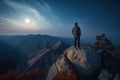 Man standing on top of a mountain and looking at the sunset, Generative AI Royalty Free Stock Photo