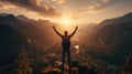 Man standing on top of the mountain, Man raising arms victoriously after climbing the mountain, Winner and Success concept Royalty Free Stock Photo