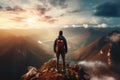Man Standing on Top of a Mountain - Overcoming Challenges With Determination and Perseverance, Hiker at the summit of a mountain Royalty Free Stock Photo