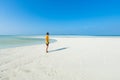 Man standing on white sand beach, Tropical Japan Royalty Free Stock Photo