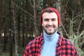 Man standing in a winter looking forest