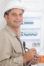 man standing and writing on clipboard Royalty Free Stock Photo