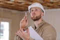 man standing and writing in folder Royalty Free Stock Photo