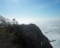 Lone man stands over the Pacific coastline Royalty Free Stock Photo