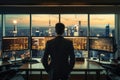 A man stands at a desk in front of a large window, focusing on his work, Real back view unknown man standing in office, row of big