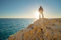 Man stands on the edge of the abyss