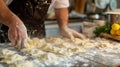 A man stands in a kitchen as he prepares pasta like Swabian Maultaschen or dumplings or ravioli