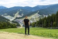 A man stands on a mountain