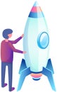 Man stands near rocket, space ship. Businessman conducting experiments with aircraft startup project