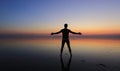 Man stands in the water on the coast Royalty Free Stock Photo