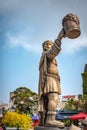 A man statue hold beer mug in front of Beer Plaza Restaurant stands towering with its giant beer barrel in the French Village