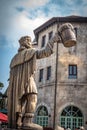 A man statue hold beer mug in front of Beer Plaza Restaurant stands towering with its giant beer barrel in the French Village