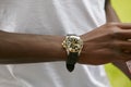 Man with steel and gold Rolex Submariner watch before Emporio Armani fashion show, Milan Fashion