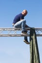 Man on steel structure no protection for safety