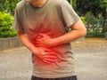 A man Stomach ache because of gastritis or that are sign of stomach trouble. Health concept Royalty Free Stock Photo