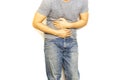 Man with stomach pain hand holding his aching belly isolated.