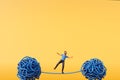 A man stood on a tangled ball of string. Overcoming stress and mental health. 3D Rendering