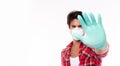 Man stop epidemic, Please stop spreading viruses, flu, covid19, coronavirus to people. Young guy wear face mask, medical glove. He