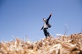 Man on straw bale