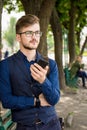 Man in the street with a phone in his hands Royalty Free Stock Photo