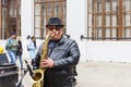 Russia, Kazan, may 1, 2018, a man on the street playing the saxophone, editorial