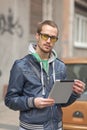 Man On Street with Tablet Computer Royalty Free Stock Photo