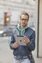 Man On Street Use Ipad Tablet Computer Royalty Free Stock Photo