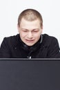 Man with Stress and annoyance lookicng in monitor