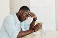 Man sitting male depressed person sad despair problem upset unhappy frustration adult stress