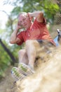 Man stretchin in park