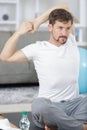 Man stretching arms before exercising Royalty Free Stock Photo
