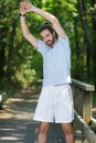 man stretching arms outside Royalty Free Stock Photo