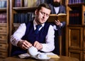 Man with strict face at tea party. Retro detective drinks Royalty Free Stock Photo