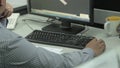 Man In Strip Shirt Working On Autocad On Engineering Design In Office - Over The Shoulder - With Movements