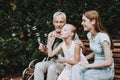 Happy Family and Young Girl. Old Man and Girl.