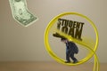 Man with STUDENT LOAN rock burden on hamster wheel showing financial struggle