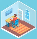 Man student sitting at desk in room. Classroom student sitting at table and writing in notebook