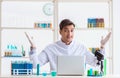 Man student working in chemical lab on experiment Royalty Free Stock Photo